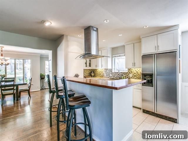 Merriman Park Masterpiece: Complete Living, Unmatched Price 7 Close-up of stylish kitchen island with butcher block breakfast bar and custom cabinetry