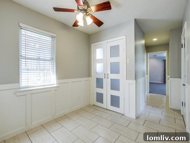 Merriman Park Masterpiece: Complete Living, Unmatched Price 8 Bright breakfast nook with frosted glass doors and contemporary tile flooring in the kitchen