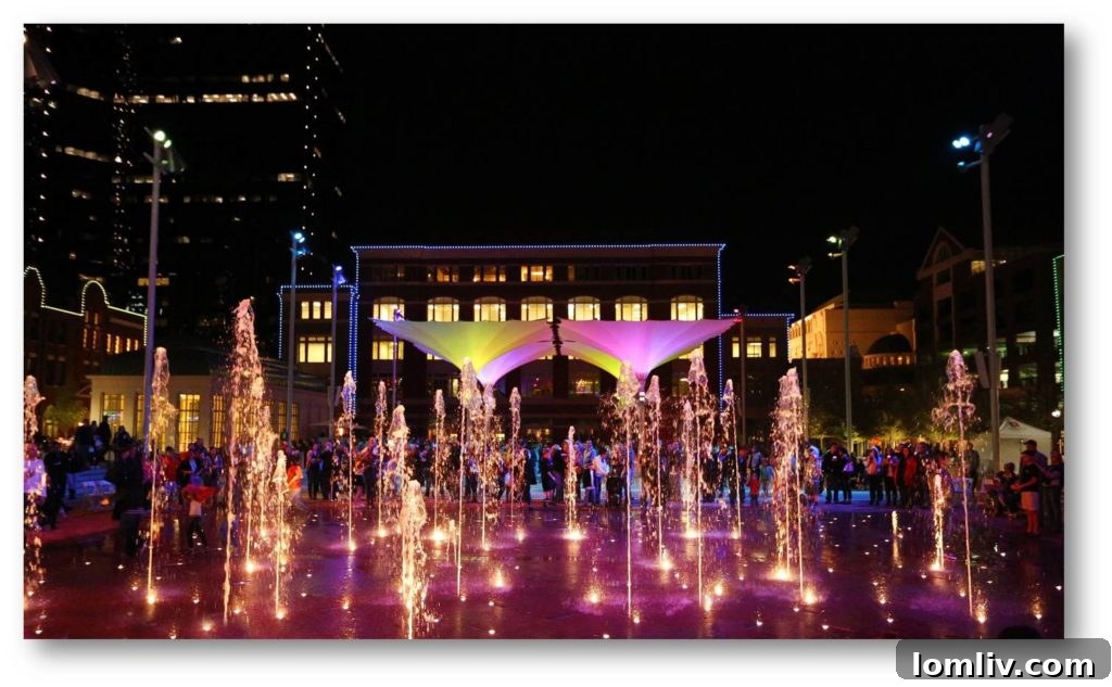Children playing in the interactive fountains at Sundance Plaza