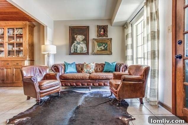 Family room with access to outdoor covered patio.