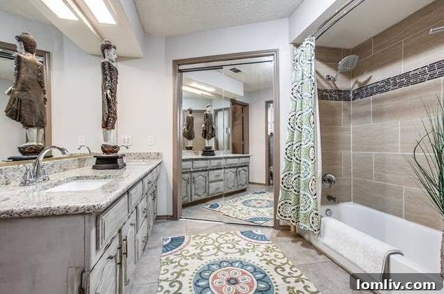 Bright master bedroom with elegant tray ceiling and ample space.
