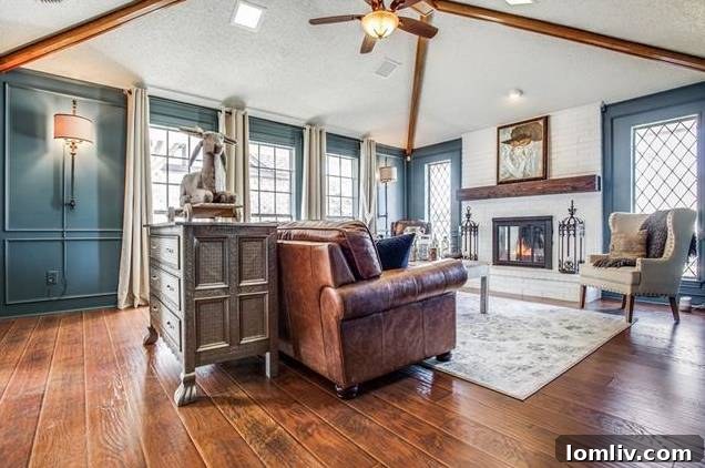 Elegant dining room with tray ceiling and contemporary decor.