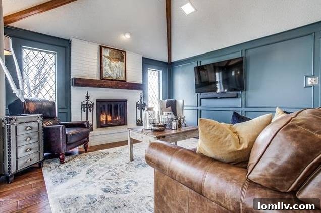 Bright and airy living room featuring hardwood floors and a cozy fireplace.