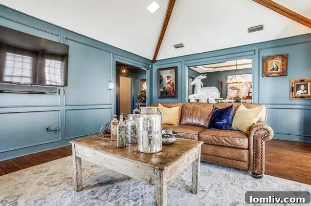 View of an inviting entryway with natural light and updated fixtures.