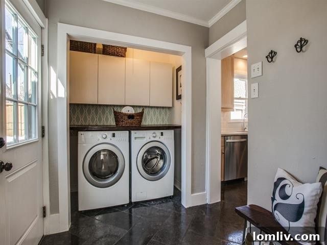 Laundry area or utility space in the Dallas Tudor home
