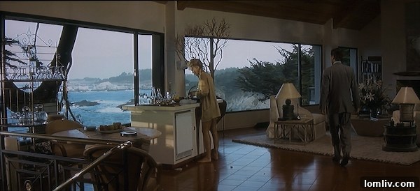 Exterior shot of the Basic Instinct movie house with ocean backdrop