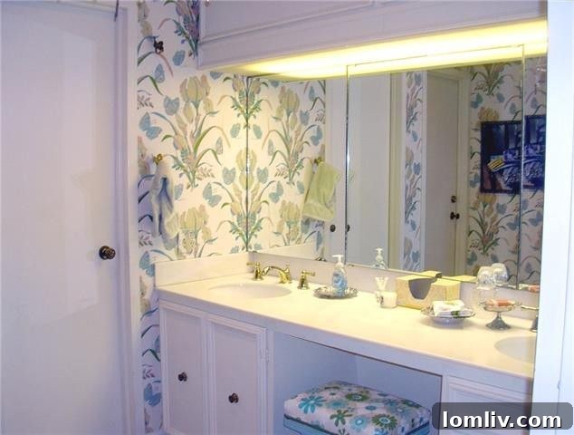 The original master bathroom vanity in Unit 1313 at The Athena, featuring outdated cabinetry and a distinctive greenish fluorescent light.