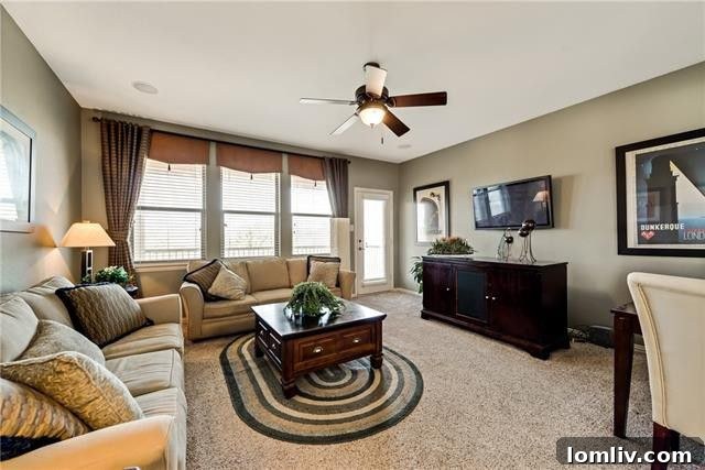 Inviting living room with contemporary furnishings and ample natural light