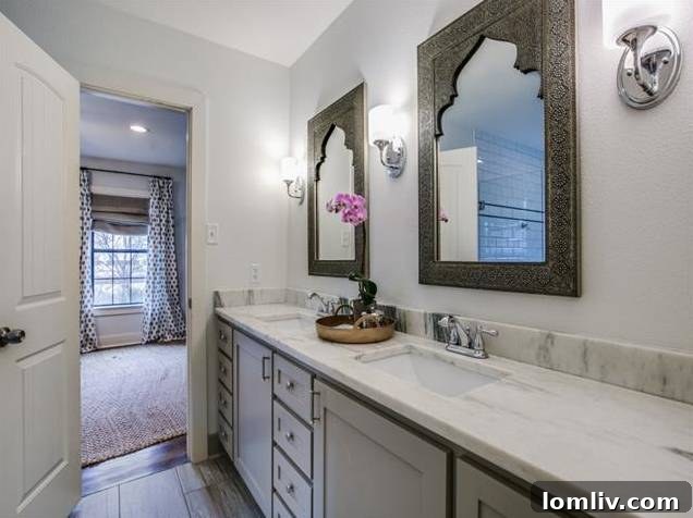 Elegant freestanding bathtub integrated into the master bathroom's wet area design.