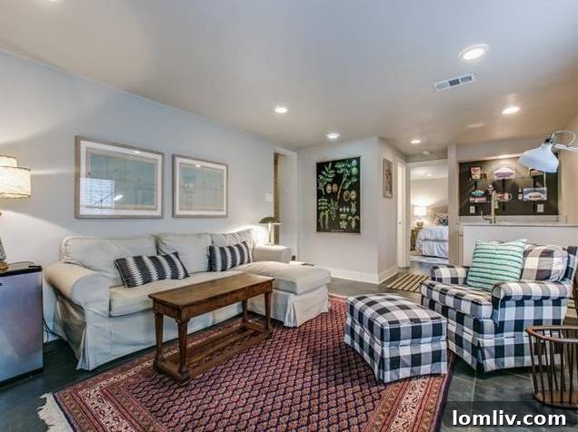 Cozy basement living area with comfortable seating and stylish decor.