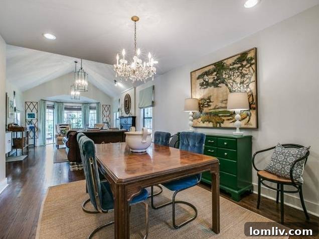 Luxurious navy blue custom kitchen cabinets with brass hardware and white quartz countertops.