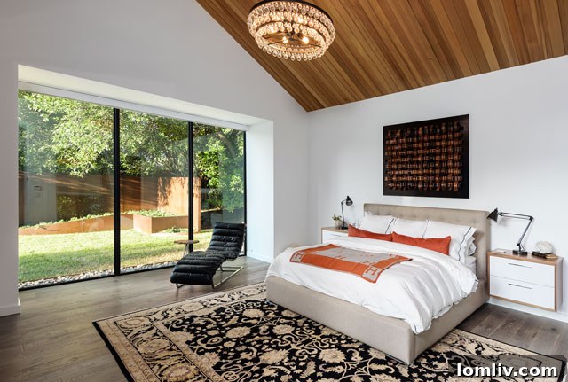 Cozy fireplace nook with integrated shelving and modern design elements