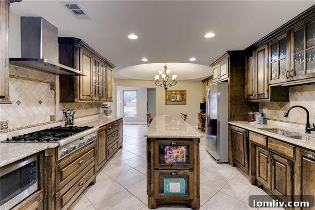 Updated Kitchen with Dark Cabinets and Granite