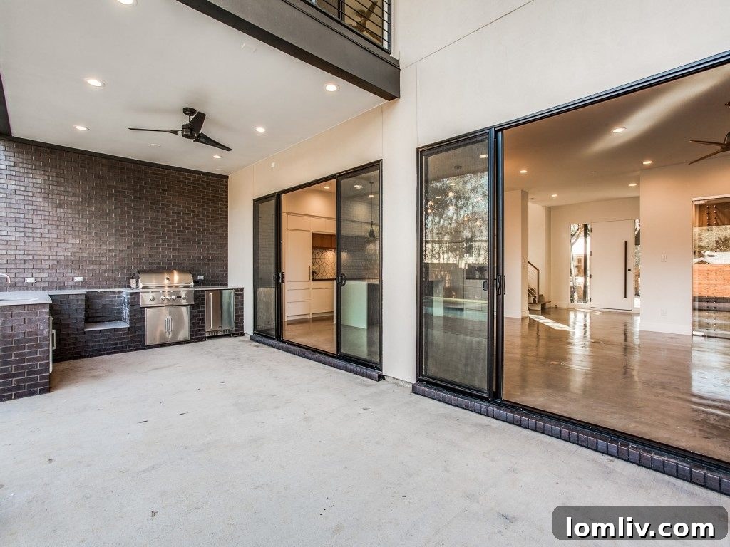 New Leaf Custom Homes Crafts Unrivaled Originality with Lakewood 12 Luxurious Backyard Patio with Built-in Grill and Pool