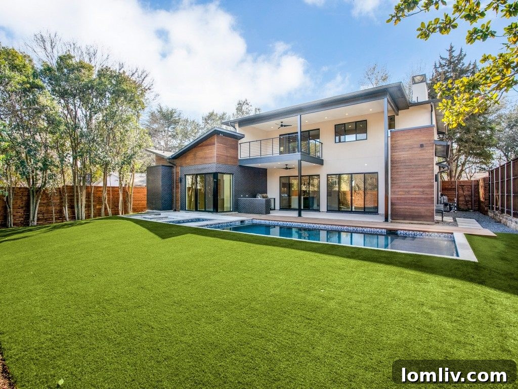 New Leaf Custom Homes Crafts Unrivaled Originality with Lakewood 13 Stunning Rear View of Custom Home with Pool