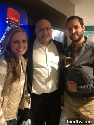 City Council member Adam Medrano talks with residents waiting in line for assistance during a gas service shutdown, providing direct support to the community.