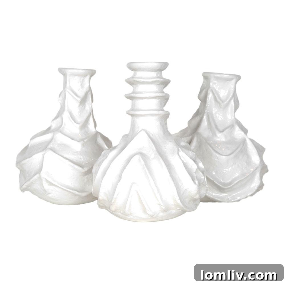 Tutsi Textured Ceramic Vases from Kanju Interiors in a contemporary white glossy glaze