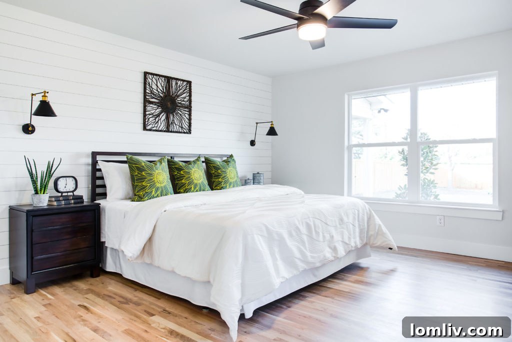 View of the open living space leading to a bedroom