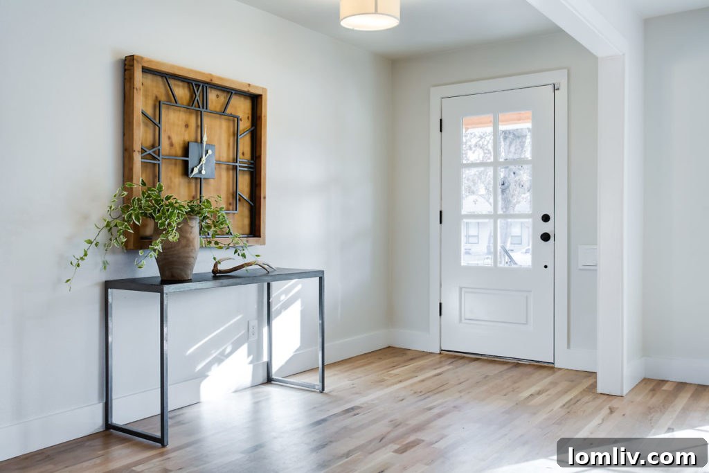 Spacious living room with natural light and elegant staging