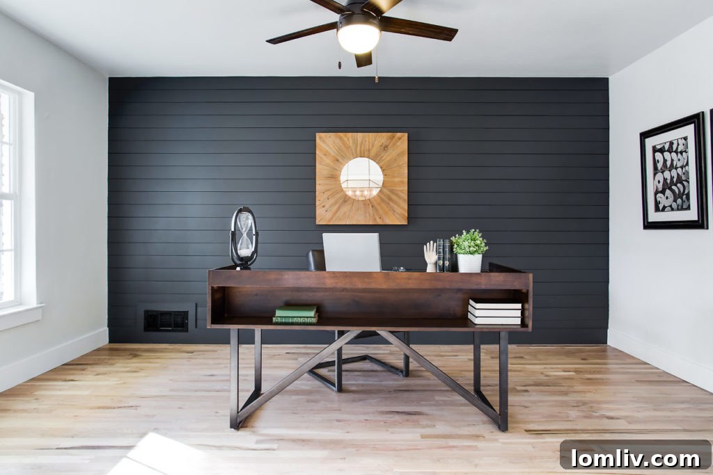 View of the open concept kitchen and living area, showcasing white oak hardwoods