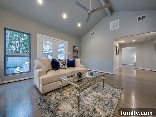 Well-appointed second bedroom at 9606 Losa, offering comfort and style