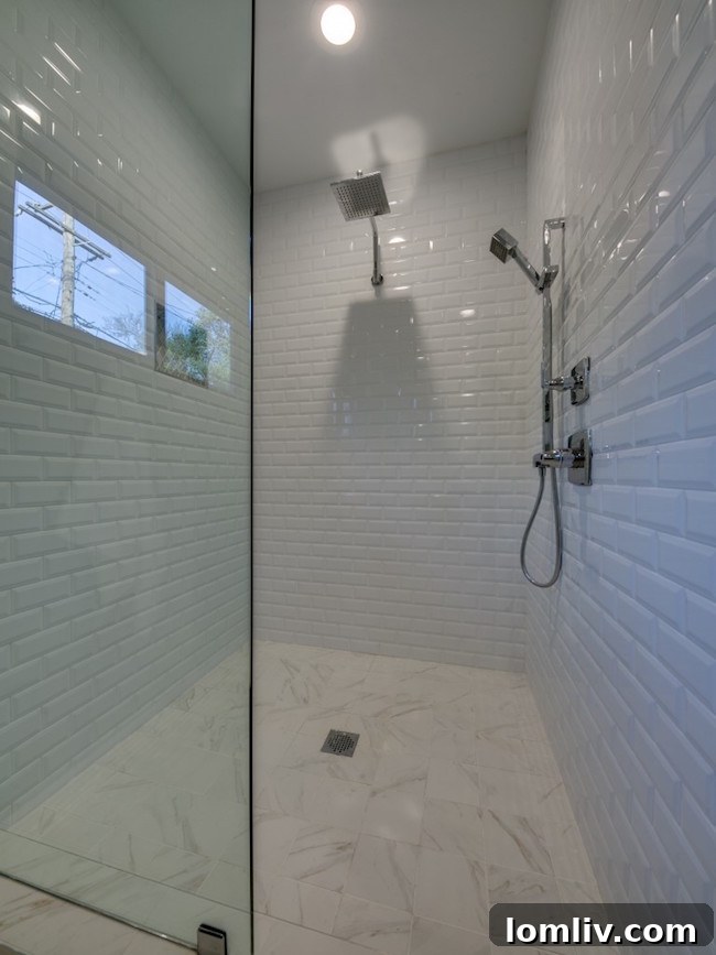 Detailed interior view showcasing the grey hardwood floors and bright aesthetic at 9606 Losa