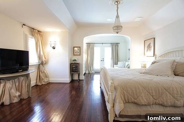 Dual vanity sinks in the master bathroom, elegantly designed with Carrara marble