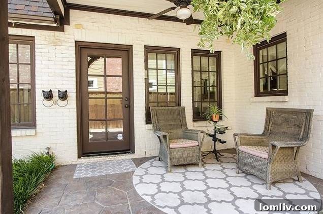 Lush, manicured backyard with a sparkling swimming pool, ideal for outdoor living