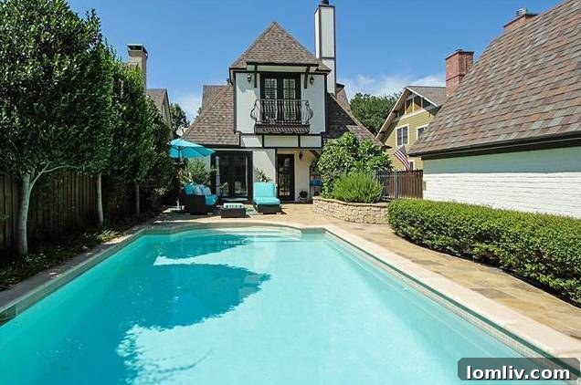 Exterior shot of the Tudor-style detached garage, matching the main house design