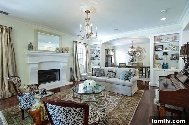 Cozy yet grand living space with fireplace and traditional architectural elements