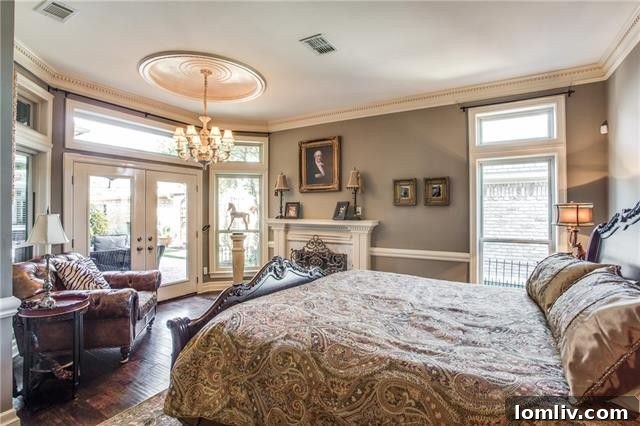 Private patio area with water fountain and synthetic lawn