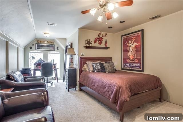Spacious secondary bedroom with bright windows