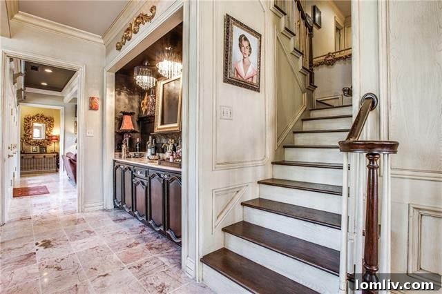 Sophisticated formal living room with a grand fireplace