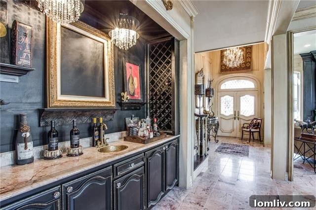 Elegant wet bar area with double chandeliers and dark accents
