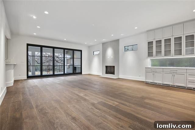 Casement windows flanking the fireplace in a bright living room, offering elegant design.