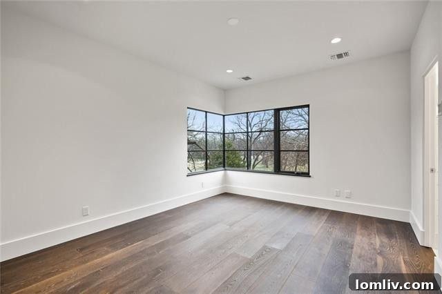 Comfortable secondary bedroom in a luxury Dallas home.