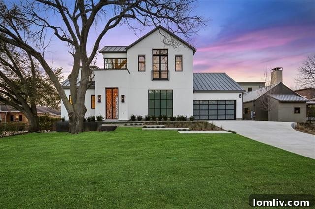 Double-door entryway leading to a private courtyard, enhancing privacy and curb appeal at 8819 Lakemont Dr.