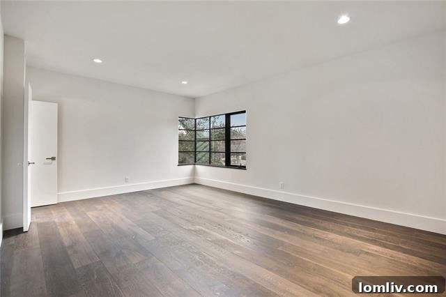 Another elegantly appointed guest bedroom in a Dallas luxury home.