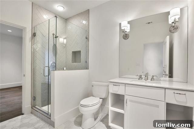 Well-appointed guest bathroom with modern finishes.