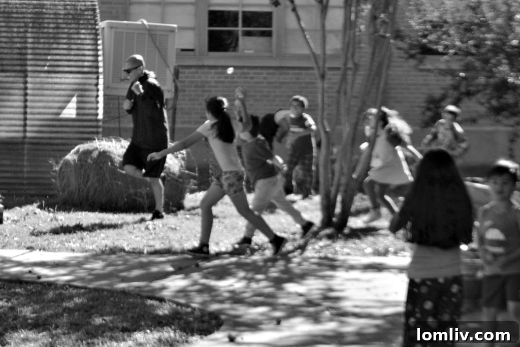 Dallas ISD Trustee's Newborn Fights for Life 2 Miguel Solis, Dallas ISD Trustee, at a water balloon party, an advocate for thousands, now for his daughter Olivia.