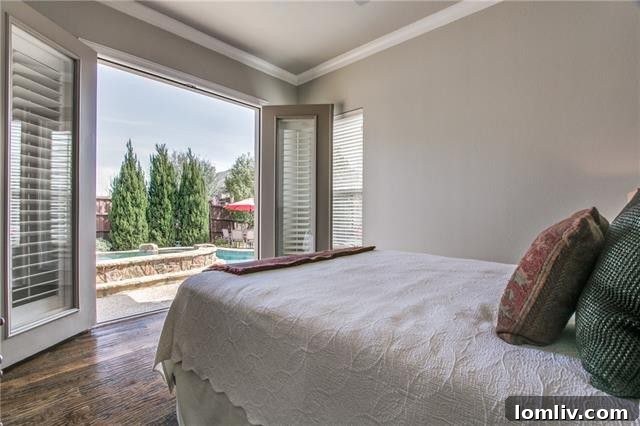 Inviting family room with stone fireplace and built-in shelving