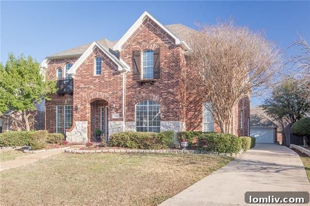 Updated traditional home exterior in Castle Hills with modern landscaping
