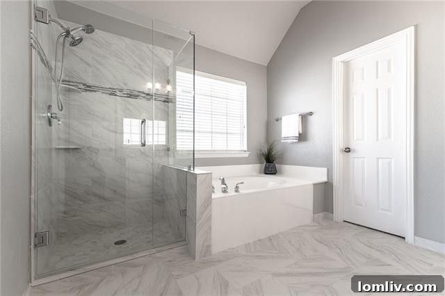 Luxurious master bedroom with ample natural light