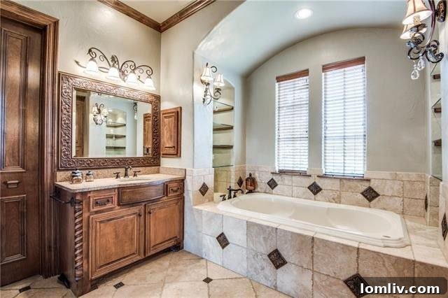 Spacious master bathroom with modern design and luxurious fixtures