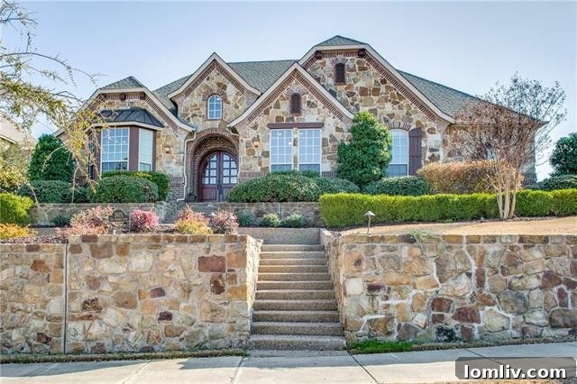 Charming stone exterior with professional landscaping in Castle Hills