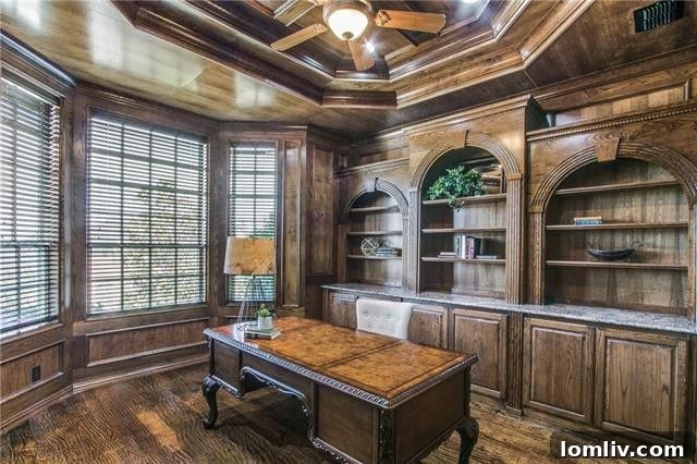 Elegant entryway with hand-scraped hardwood floors and high ceilings
