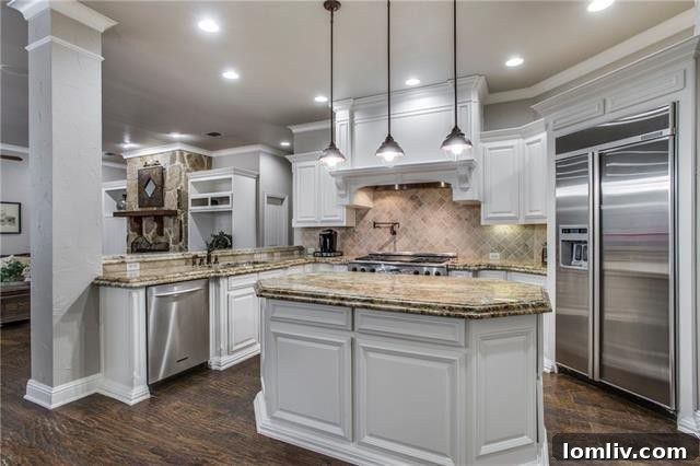 Gourmet kitchen with center island, Dacor appliances, and ample storage