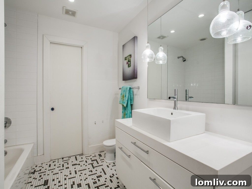 Sophisticated bathroom with double vanity and walk-in shower