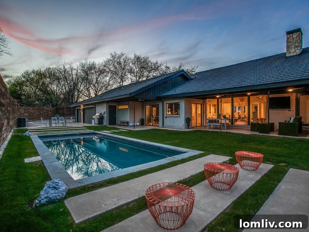 Laundry room with modern appliances and ample counter space