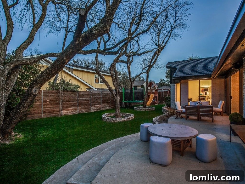 Exterior view of 6930 Brookshire Drive, showing modern landscape